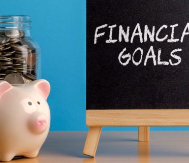 Financial Goals Financial Concept. Mason Jar With Coins Inside Piggy