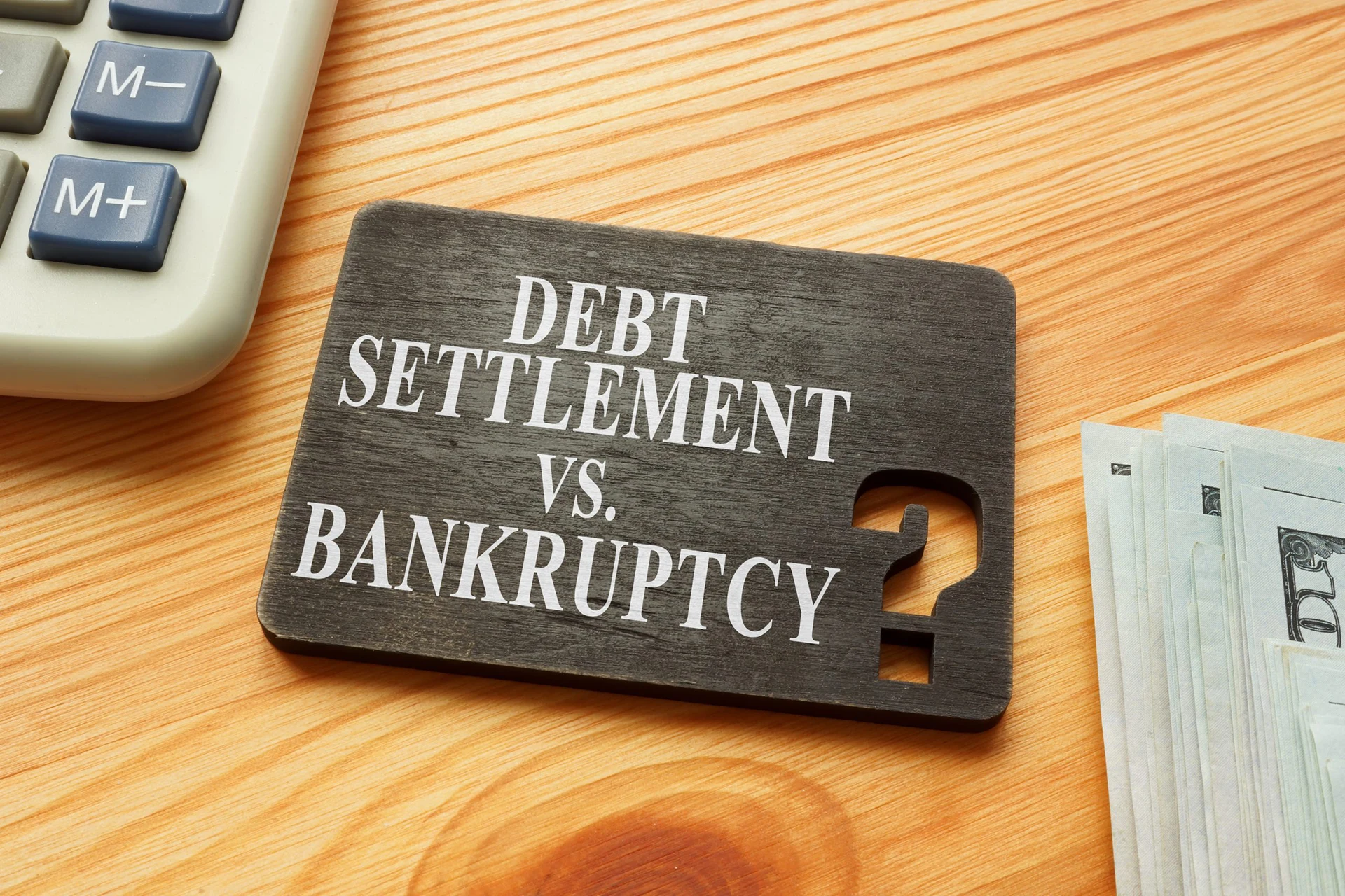 Debt settlement vs. Bankruptcy—Pros and Cons